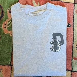 Primitive skateboarding tee